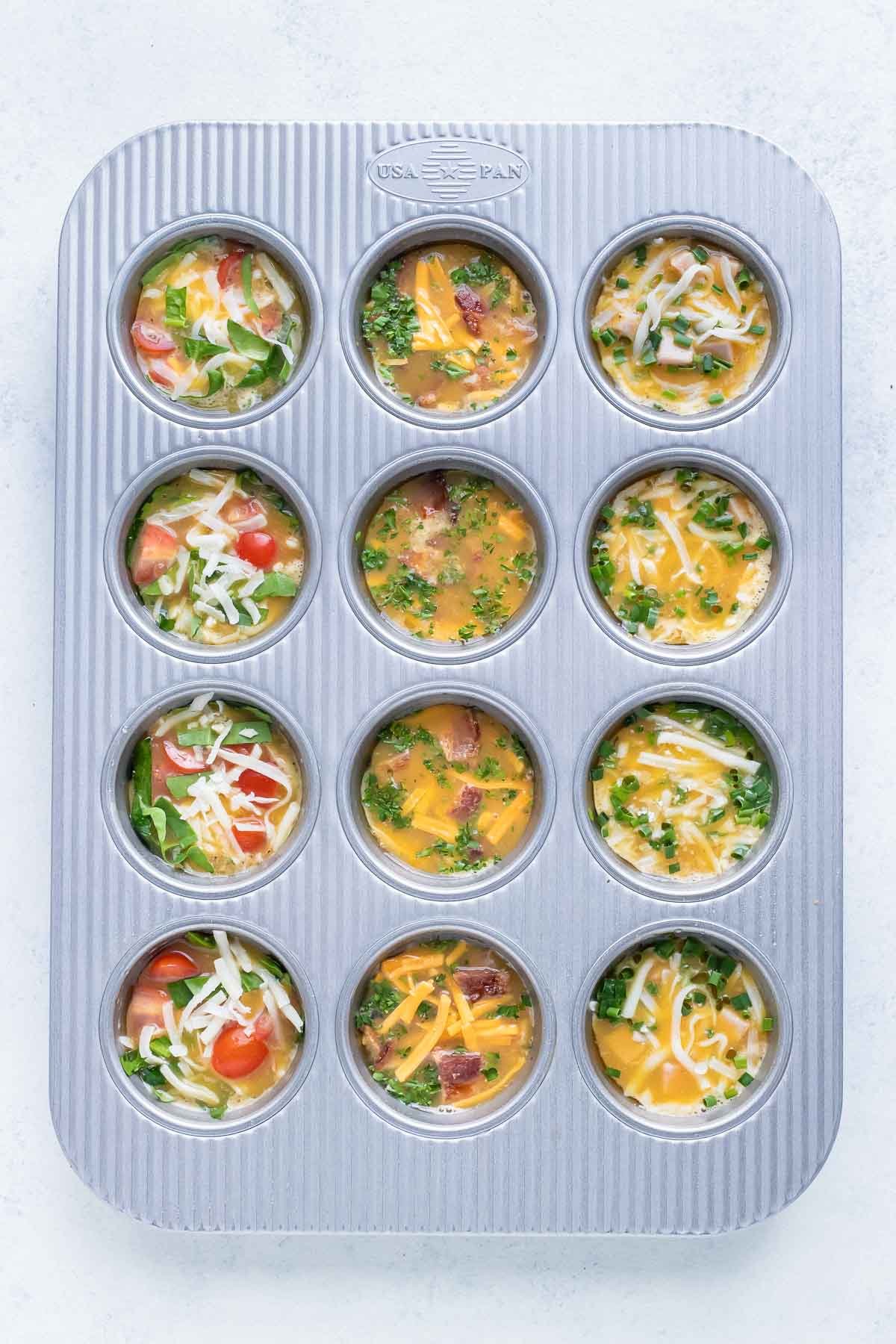 Add-ins are added to each muffin tin and egg mixture.