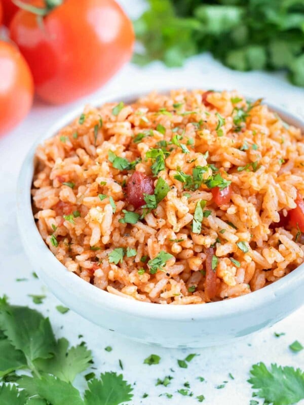 Instant Pot Mexican Rice is served in a big white bowl for dinner.