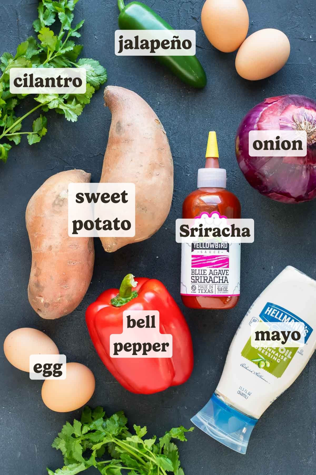 The ingredients for a sweet potato hash recipe with eggs.