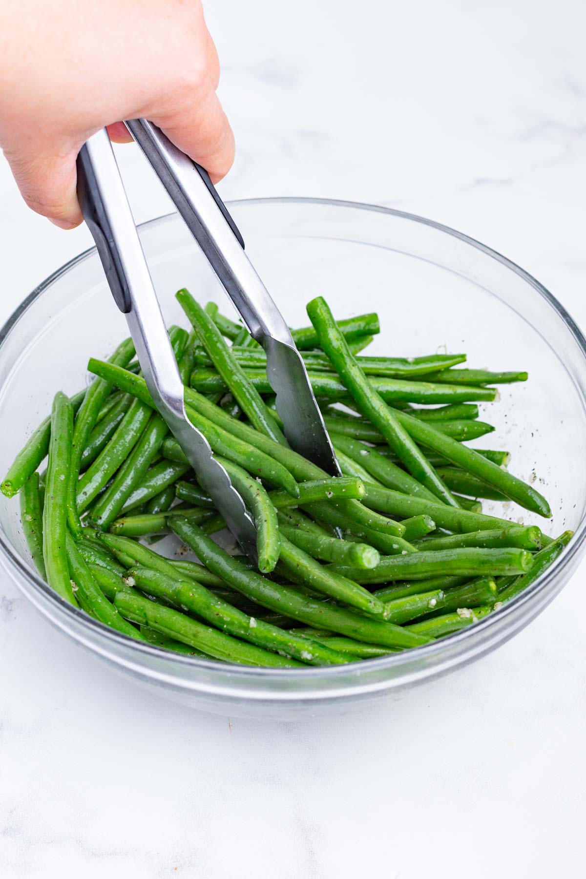 Green beans are tossed with the seasoning mix.