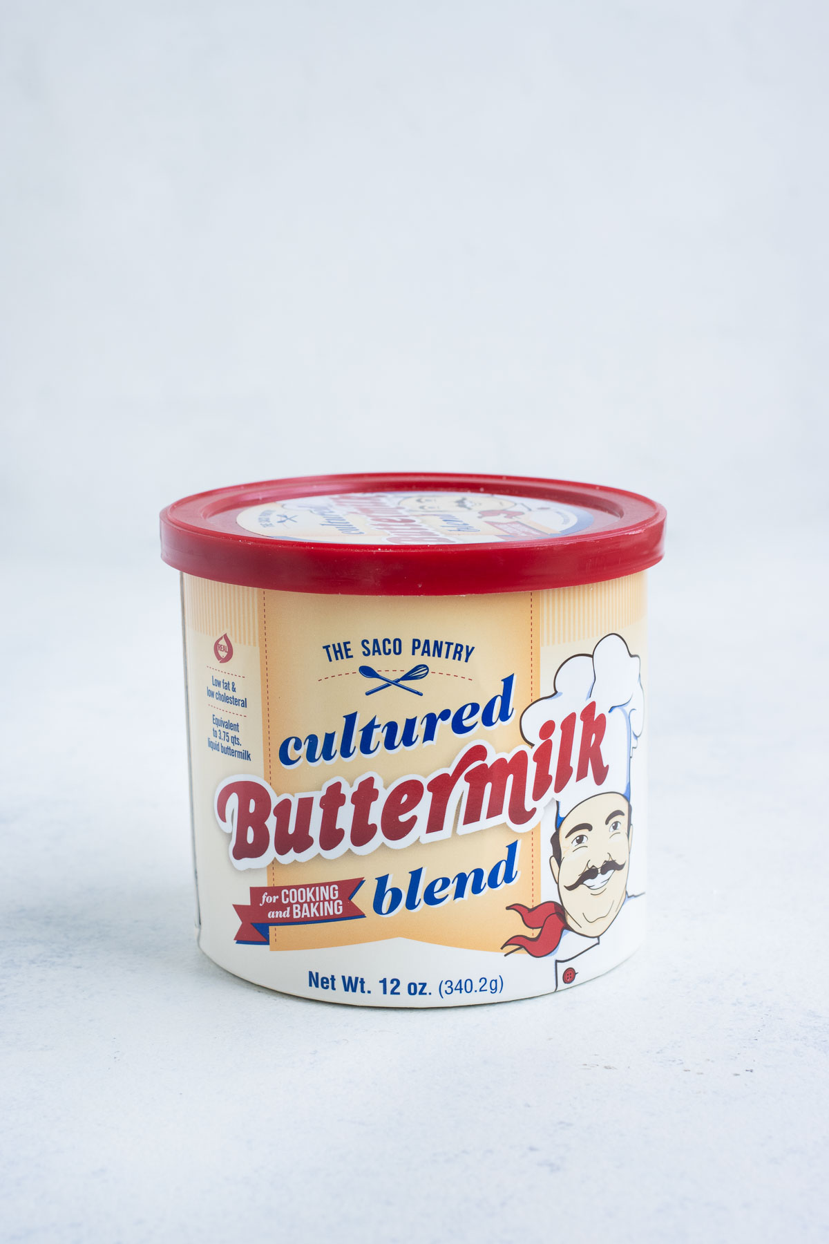 Cultured buttermilk blend sitting on the countertop in its original container.