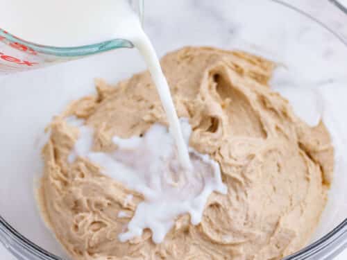 Milk is added to the cake batter.