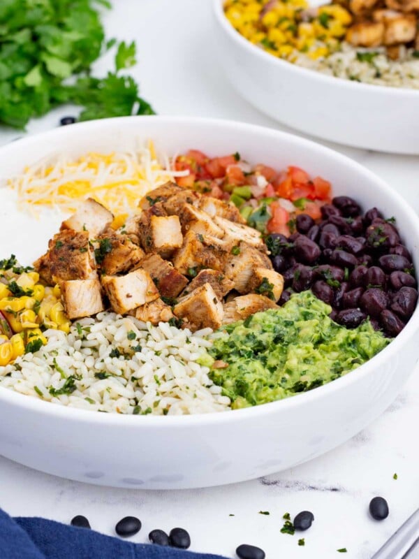 Making burrito bowls at home is easy, healthy, and delicious.