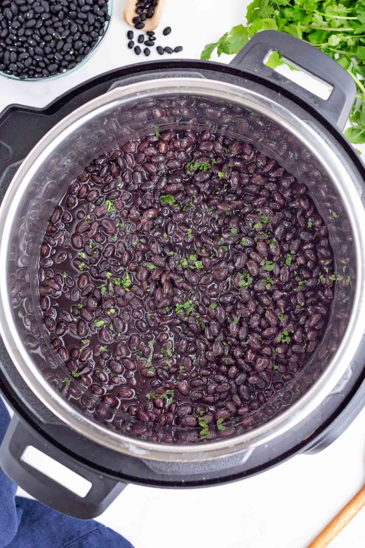 Black beans are cooked in an Instant Pot.