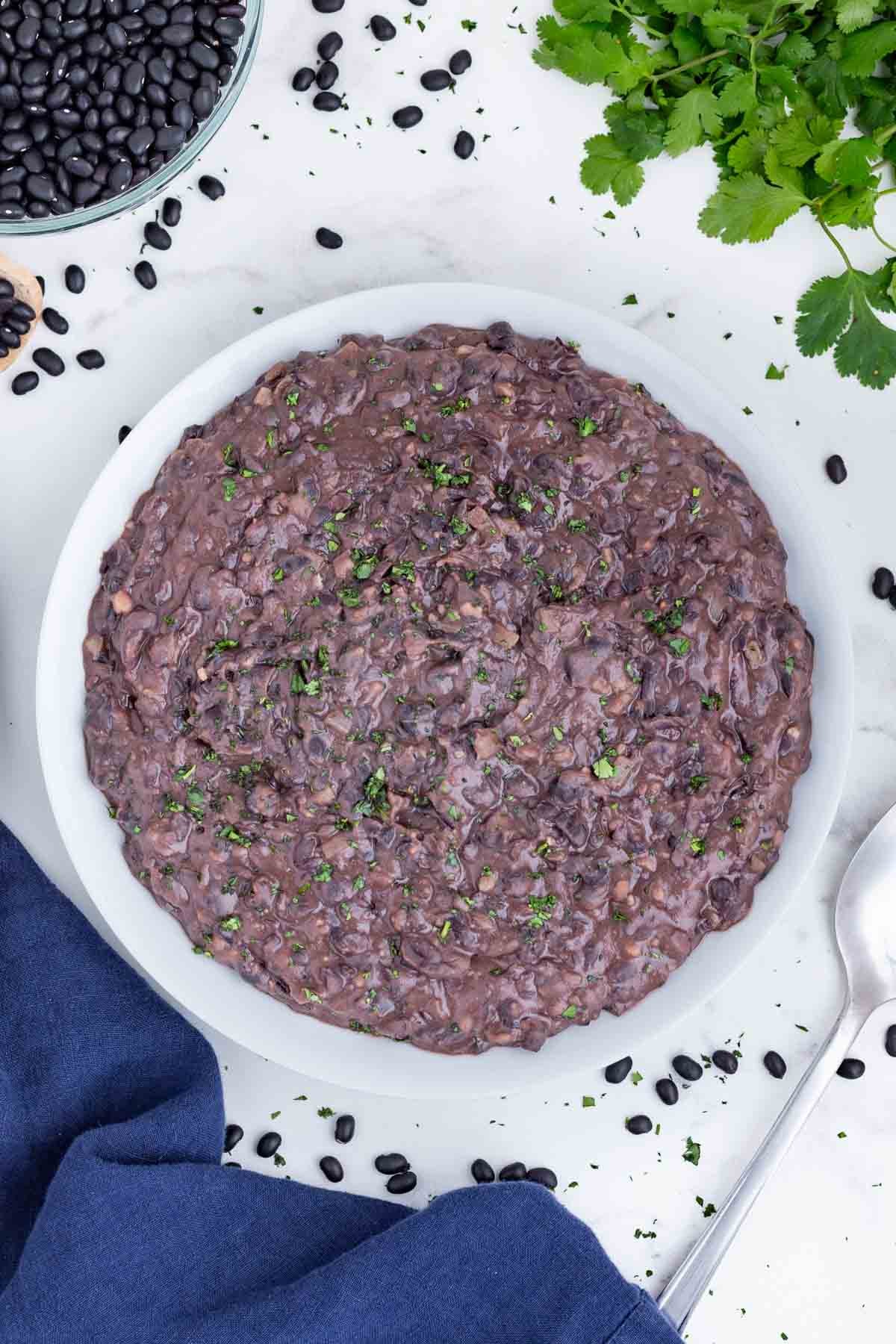 An overhead shot of refried black beans cooked in the instant pot.