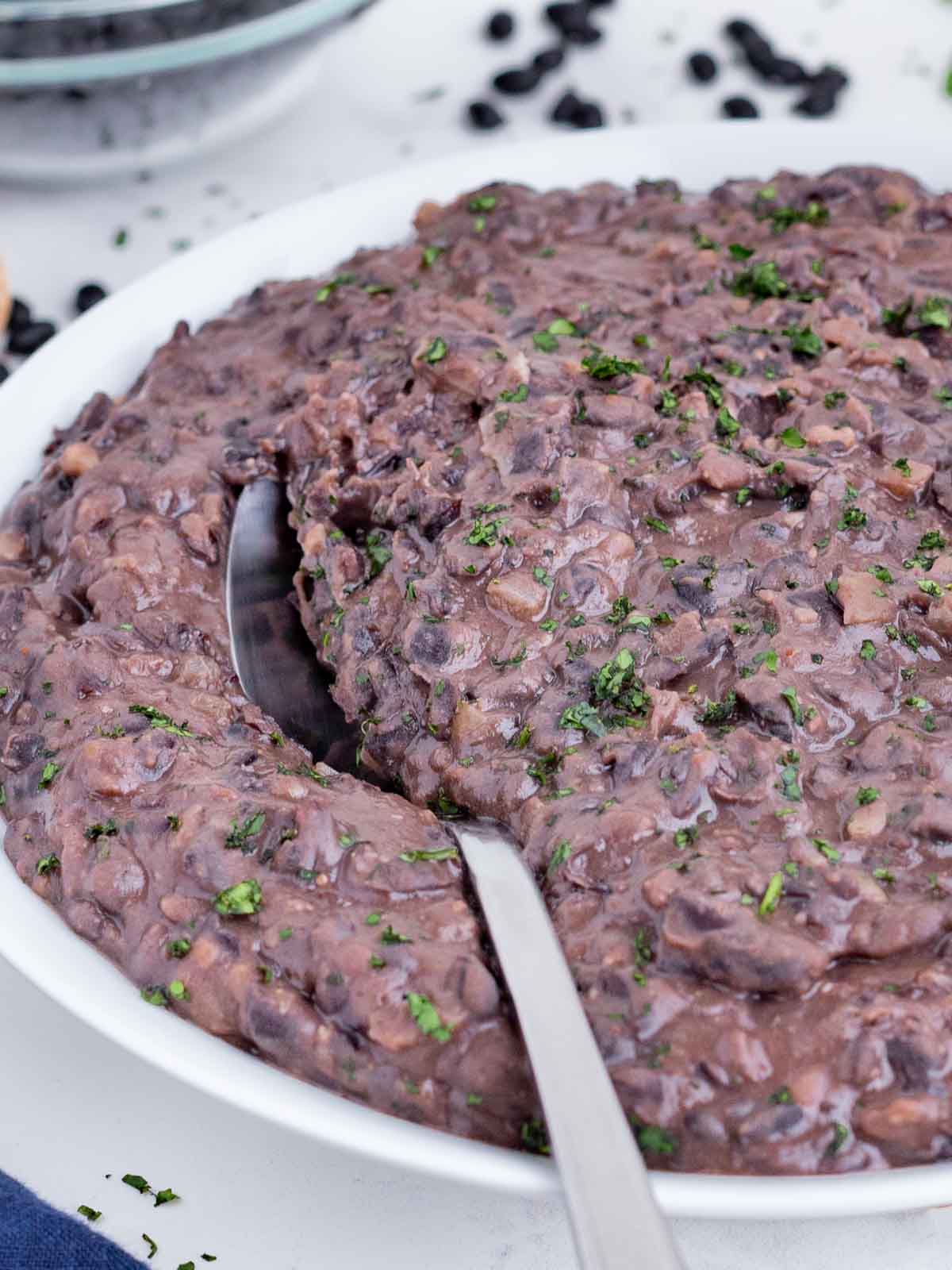 Instant Pot refried black beans take half the time as the traditional types.