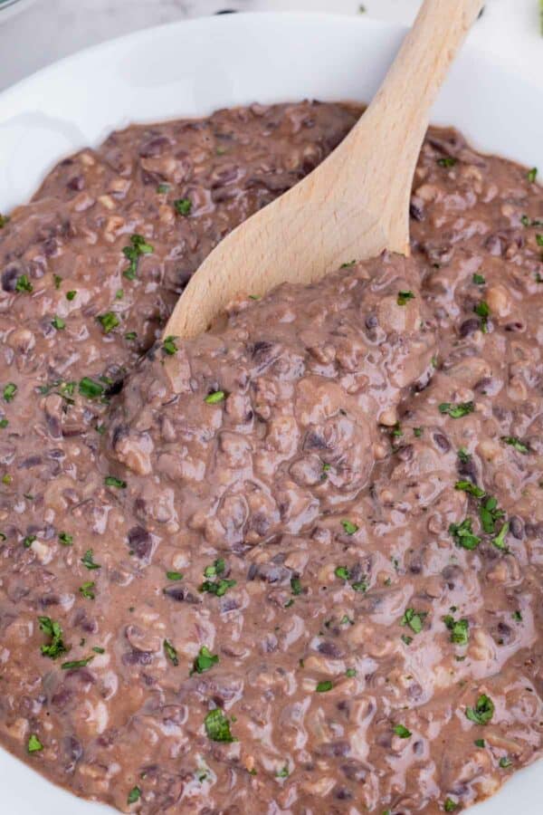 Serve these refried black beans made in a skillet as a healthy side dish.