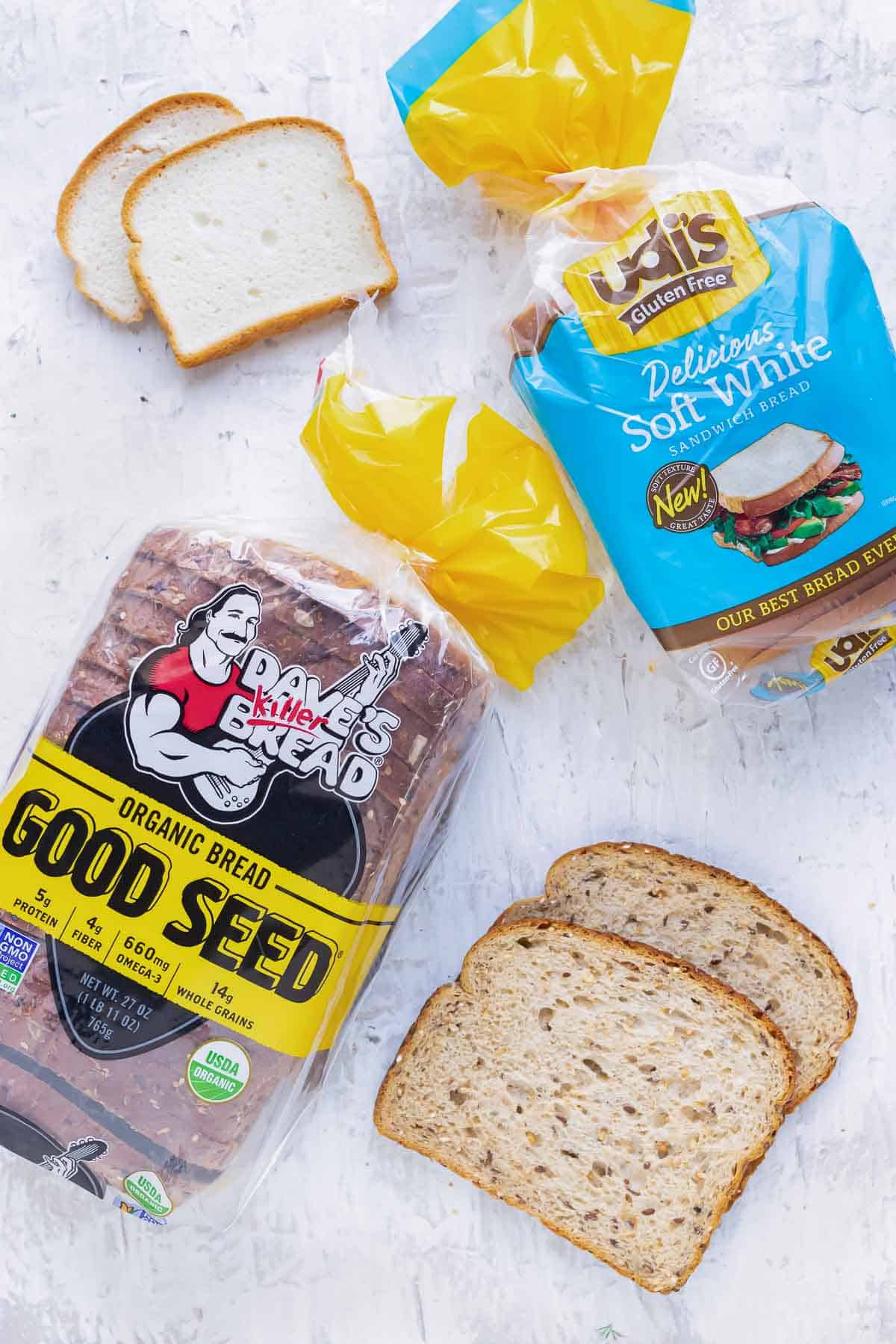 Gluten-free sandwich bread and whole wheat regular sandwich bread for a chicken salad sandwich recipe.