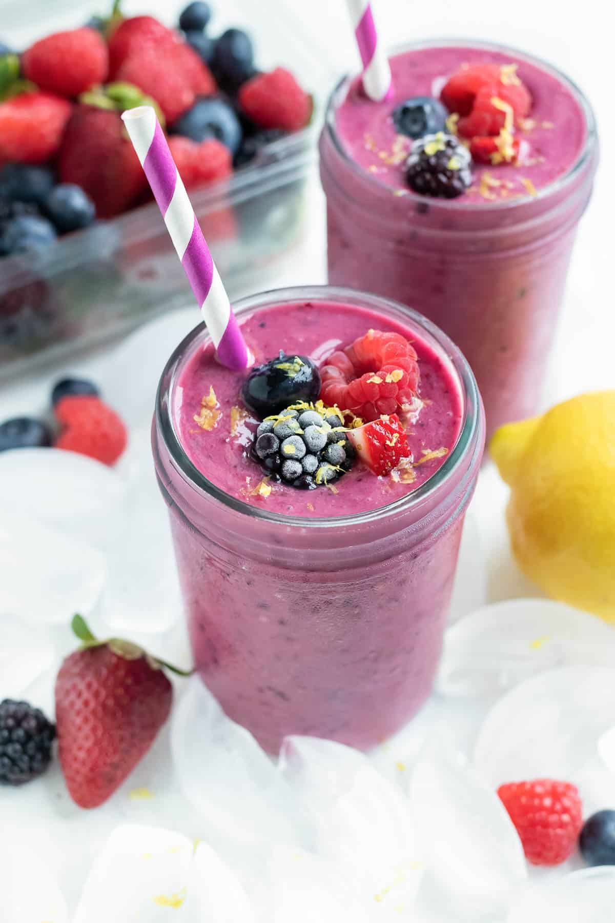 Mixed Berry Smoothies are a thick drink enjoyed with berries and fresh lemon zest.