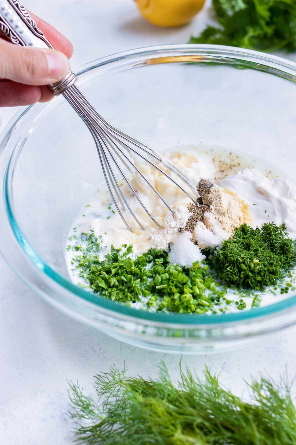 The ingredients are mixed together in a glass bowl on the counter.