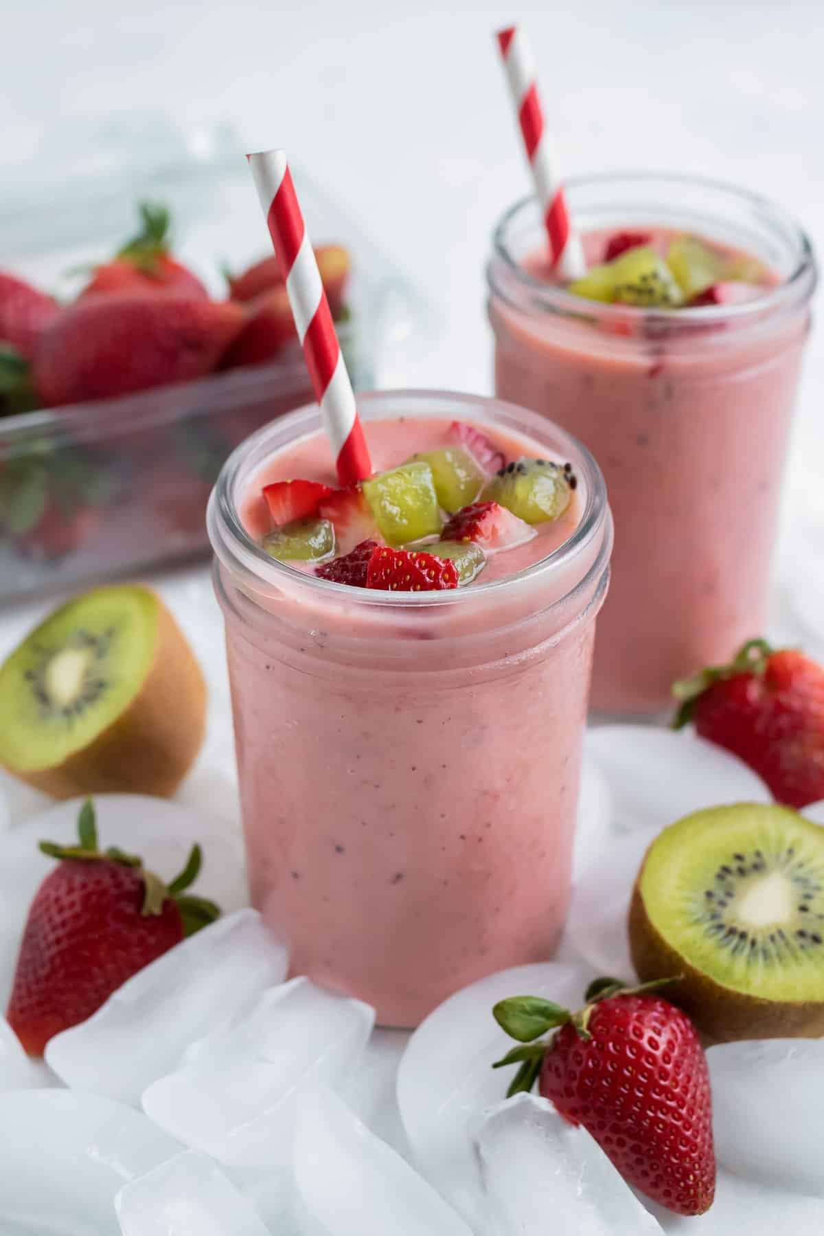 Easy strawberry kiwi smoothie is served for a cold, creamy drink.