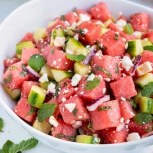 A quick, easy, and healthy watermelon fruit salad recipe with cucumber, feta cheese, and mint.