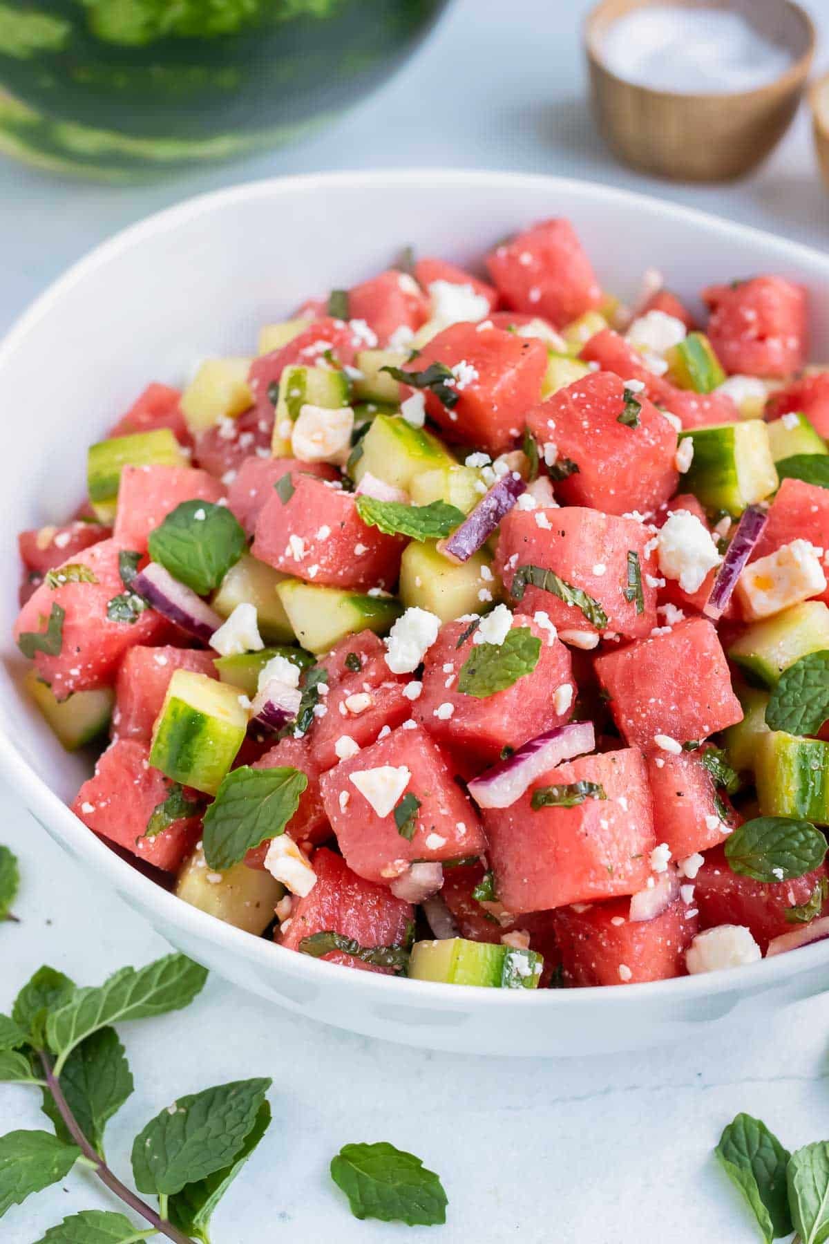 A quick, easy, and healthy watermelon fruit salad recipe with cucumber, feta cheese, and mint.