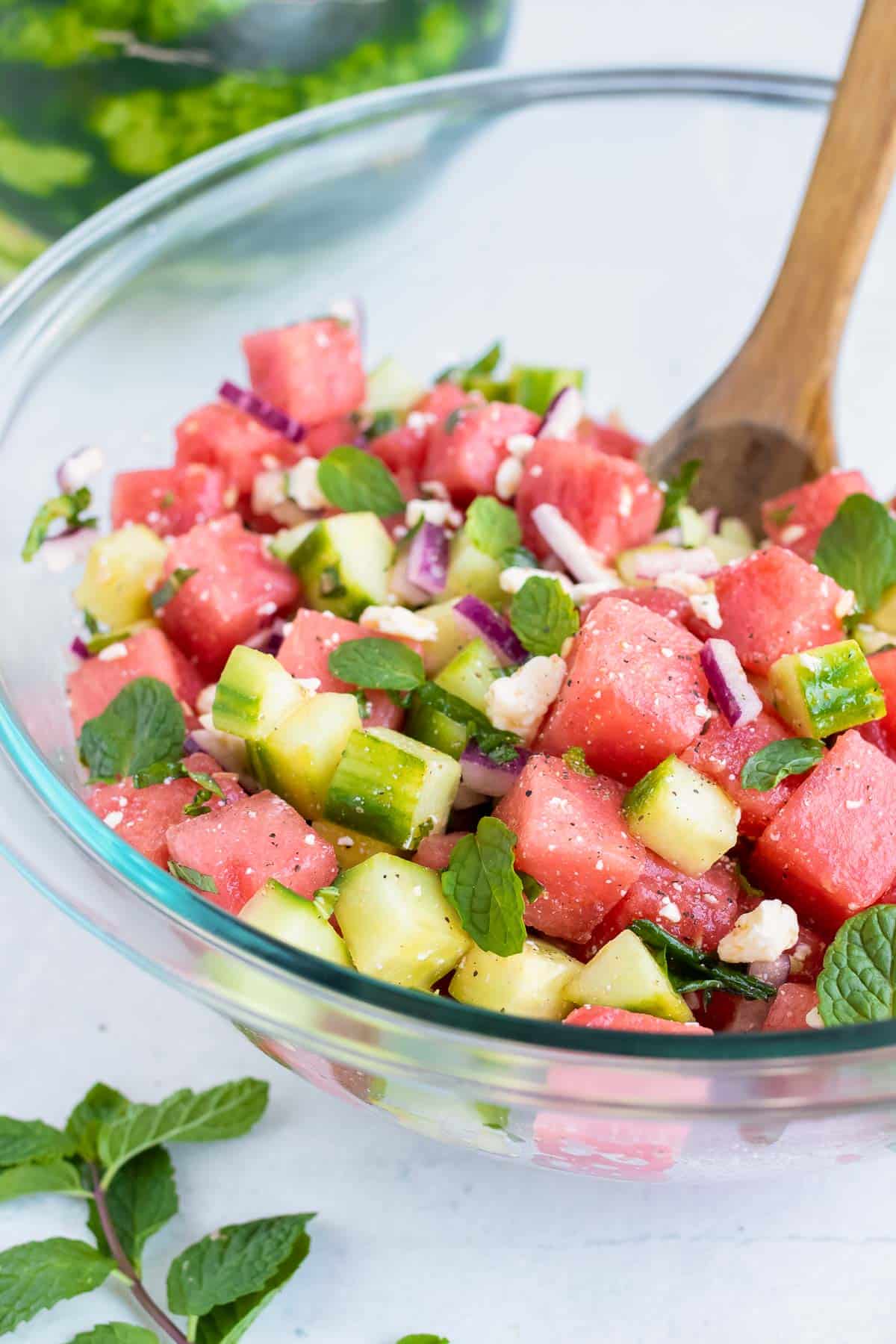 A watermelon feta salad to be served as a summer picnic side dish.