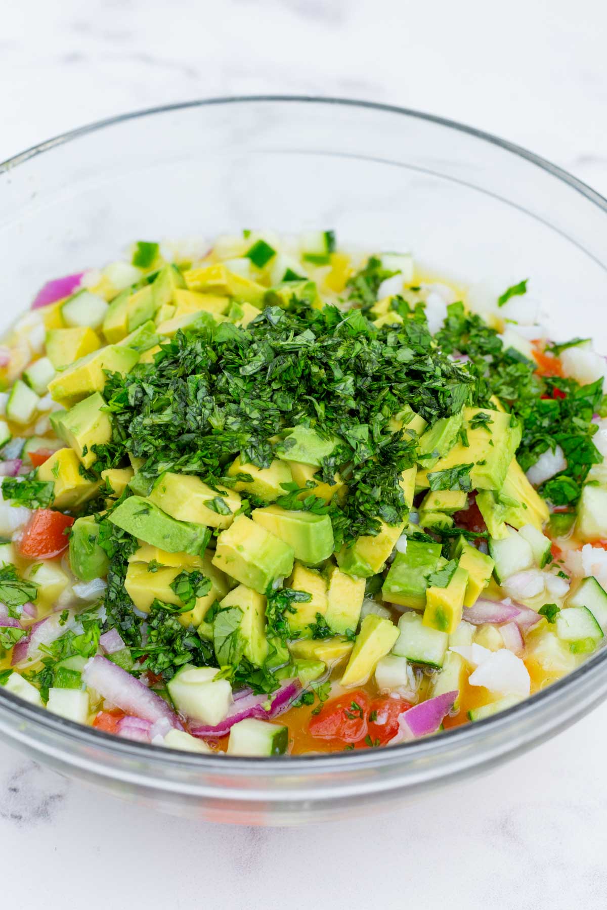 Avocado and cilantro are added just before serving.