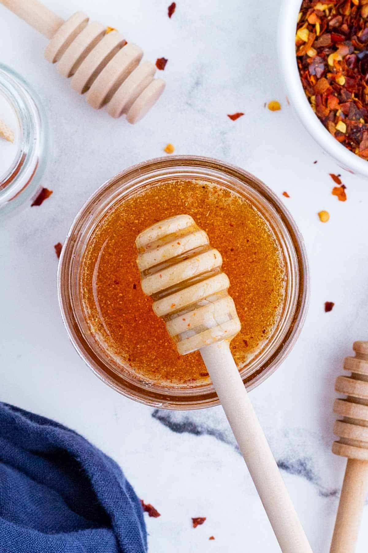 Hot honey is sweet and spicy and the perfect condiment. It can be stored in a glass jar for years.