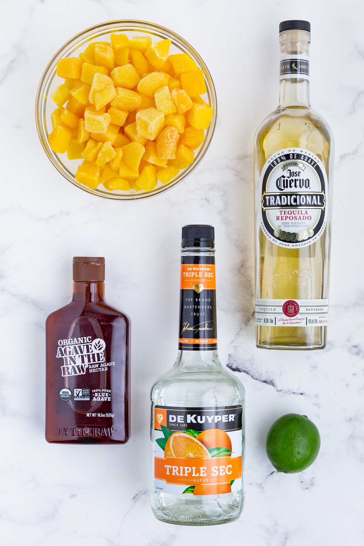 Tequila, triple sec, mango, lime juice, and agave are the ingredients for this drink.