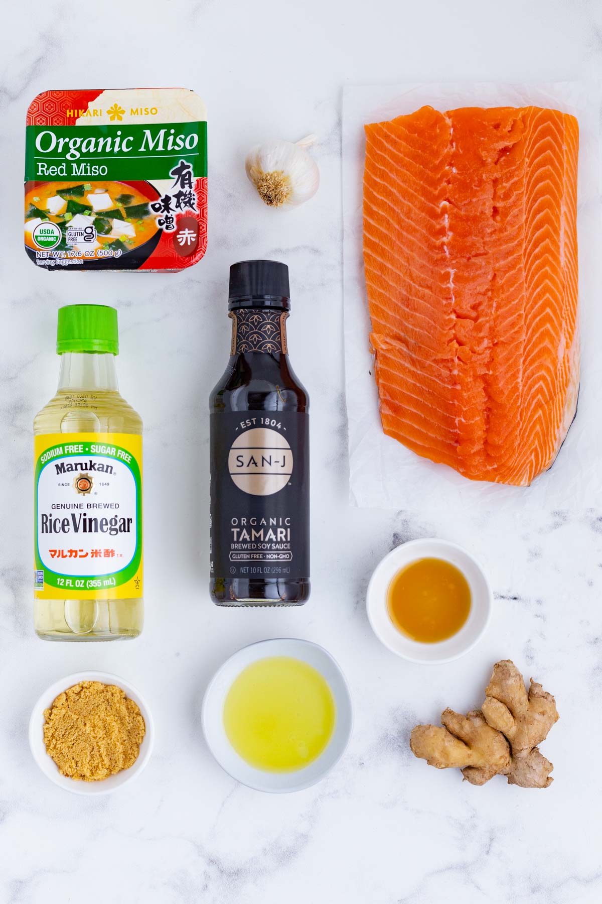 Salmon, soy sauce, miso paste, garlic, ginger, oil, and seasonings are the ingredients for this dish.