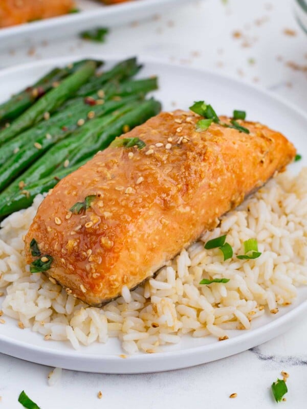 Salmon, green beans, and brown rice is a healthy meal.