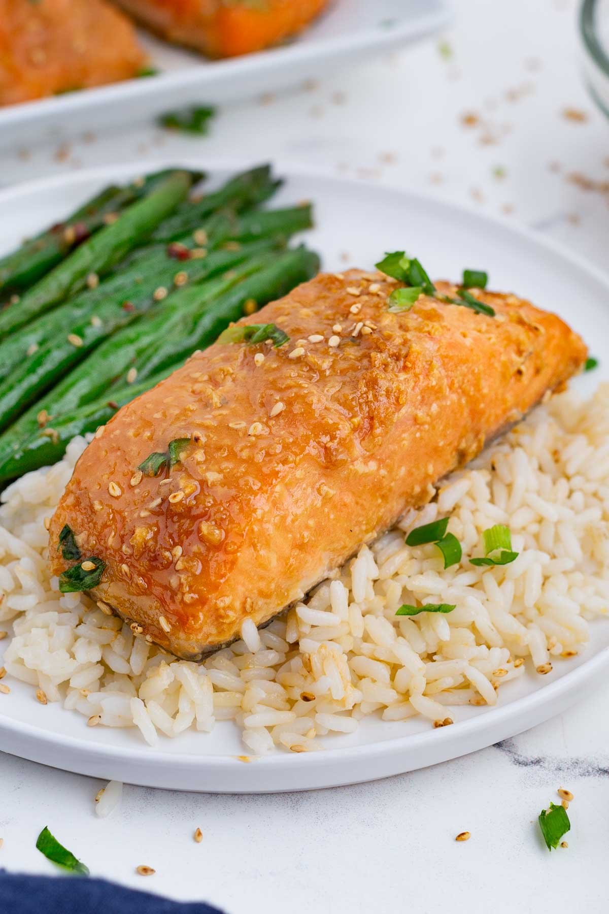 Salmon, green beans, and brown rice is a healthy meal.