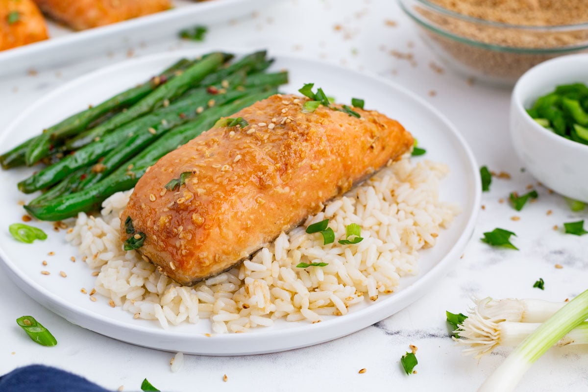 Salmon, green beans, and brown rice is a healthy meal.