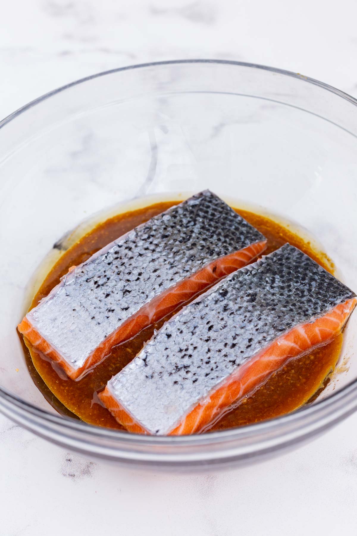 Salmon fillets are marinated in a miso glaze.
