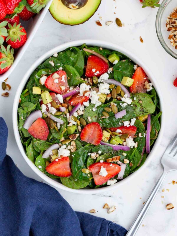 This strawberry spinach salad is the perfect dish for hot, summer months.