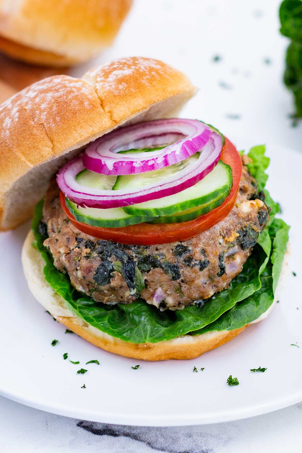 This burger is full of Mediterranean flavor and easy to cook at home on the stove.