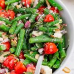 Green bean salad is full of healthy and refreshing ingredients.