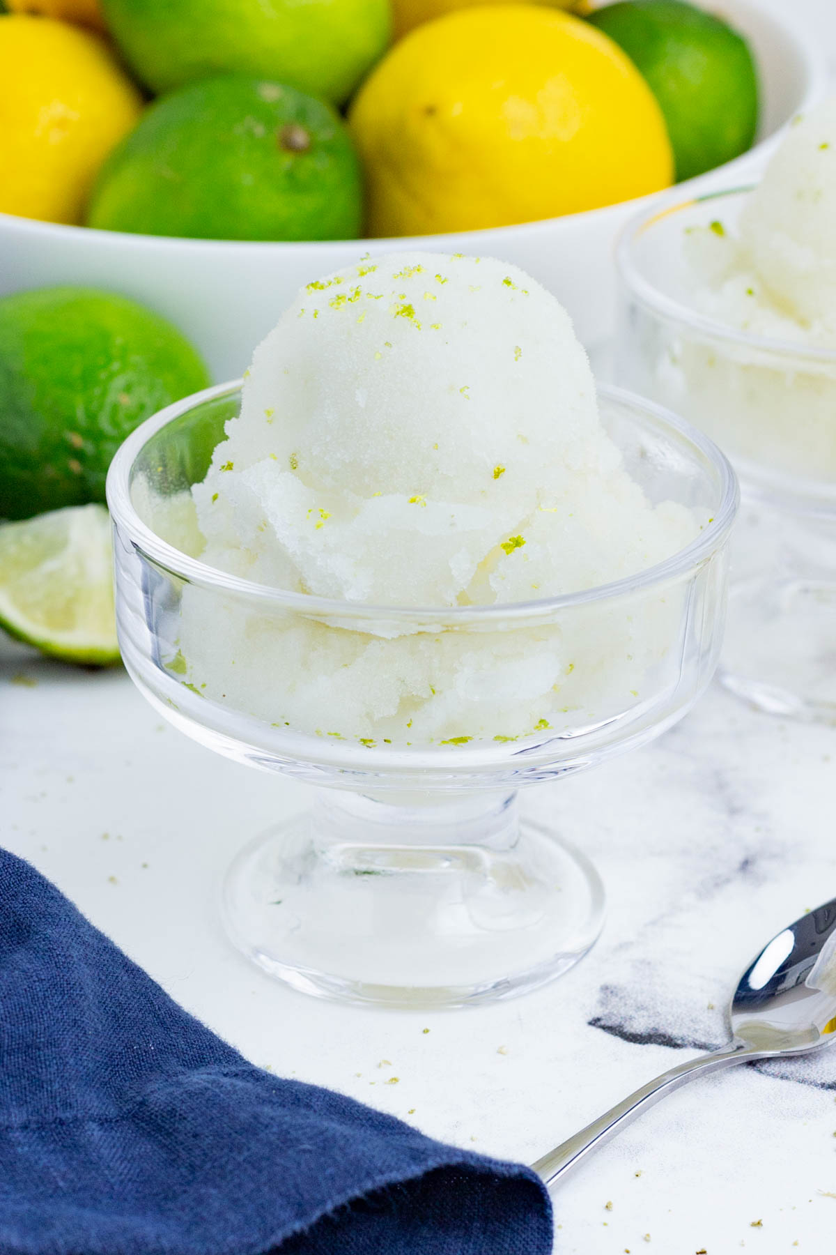 Lime sorbet is simple to make with lime juice and zest along with simple syrup.
