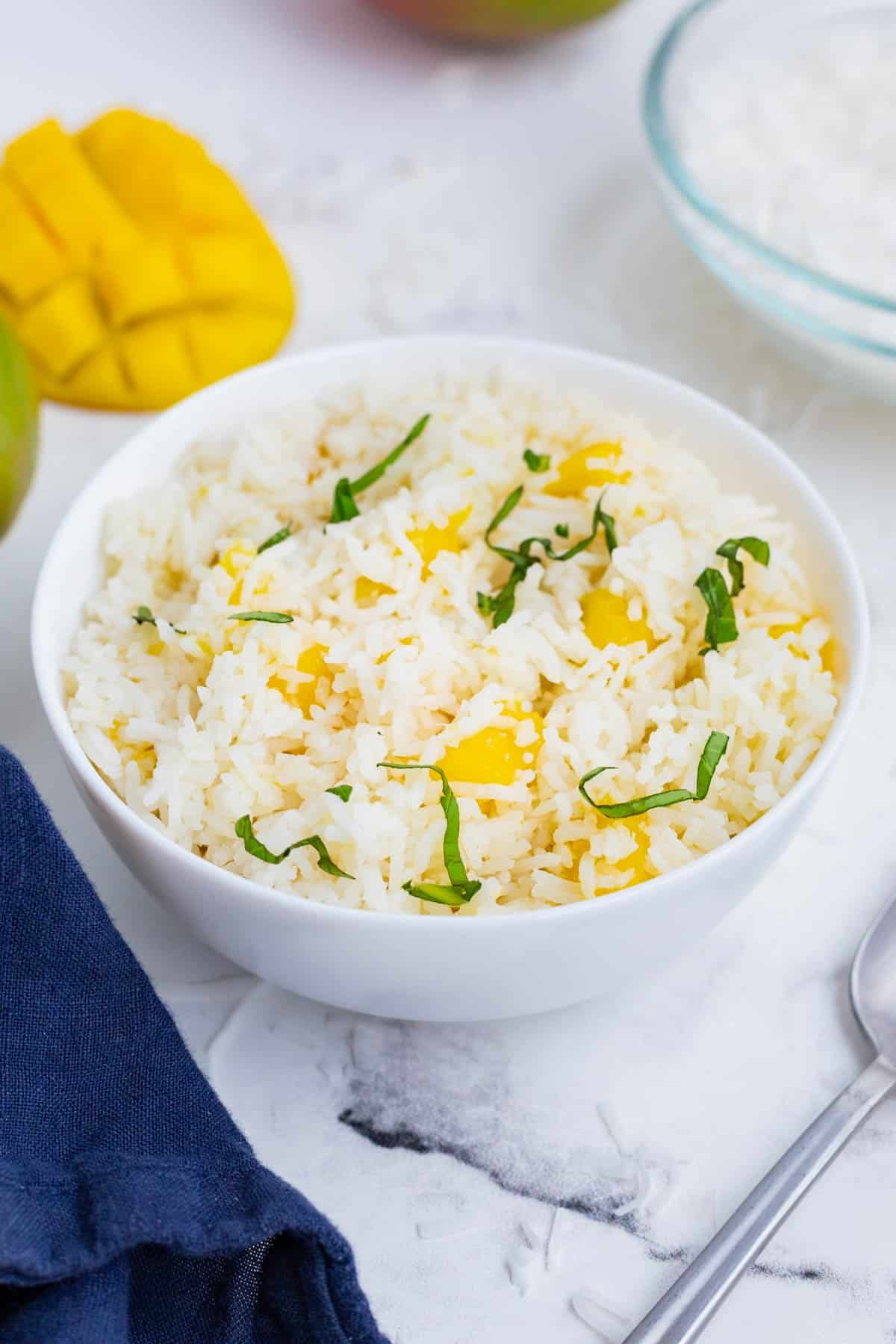 Sweet yet savory mango coconut rice is an easy and flavorful side dish.