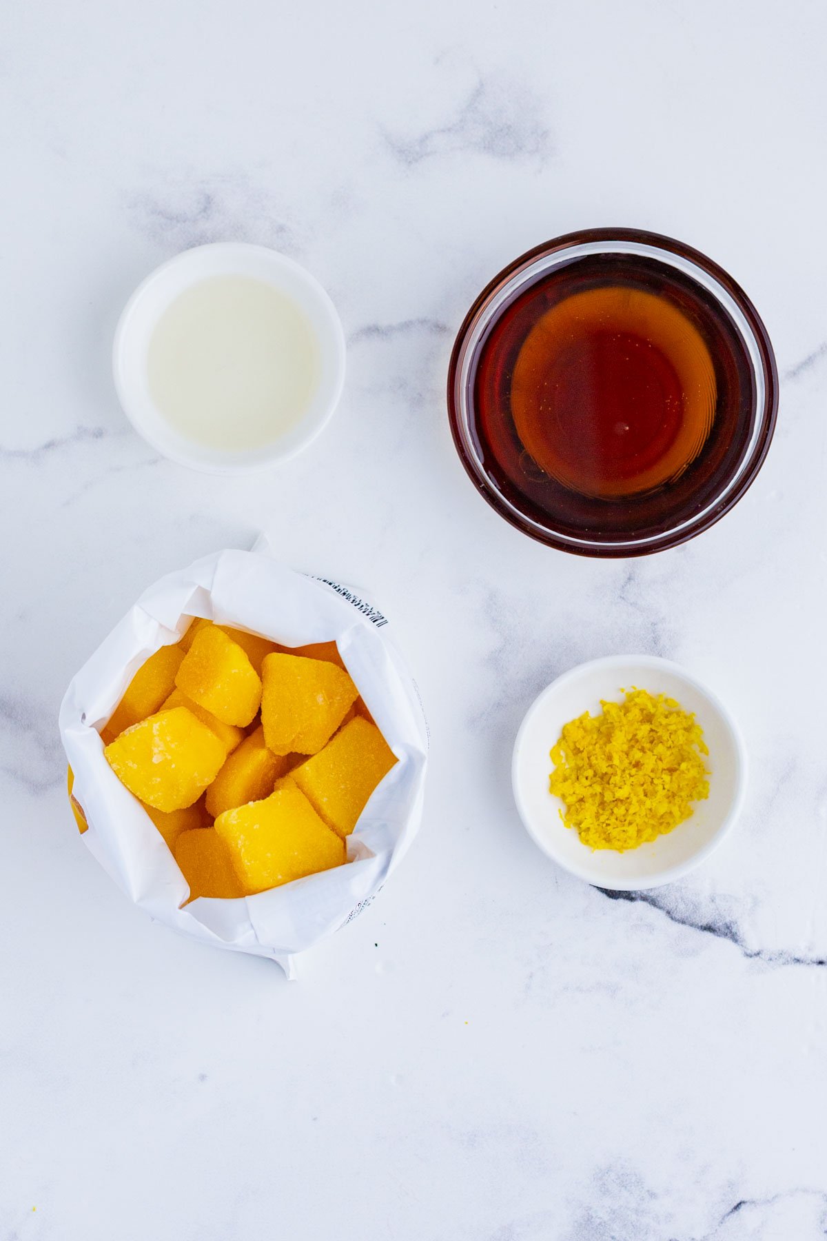 Frozen mango, sweetener, and citrus are the ingredients for this dish.