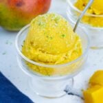 Mango sorbet only needs frozen mango, citrus, and sweetener to make.