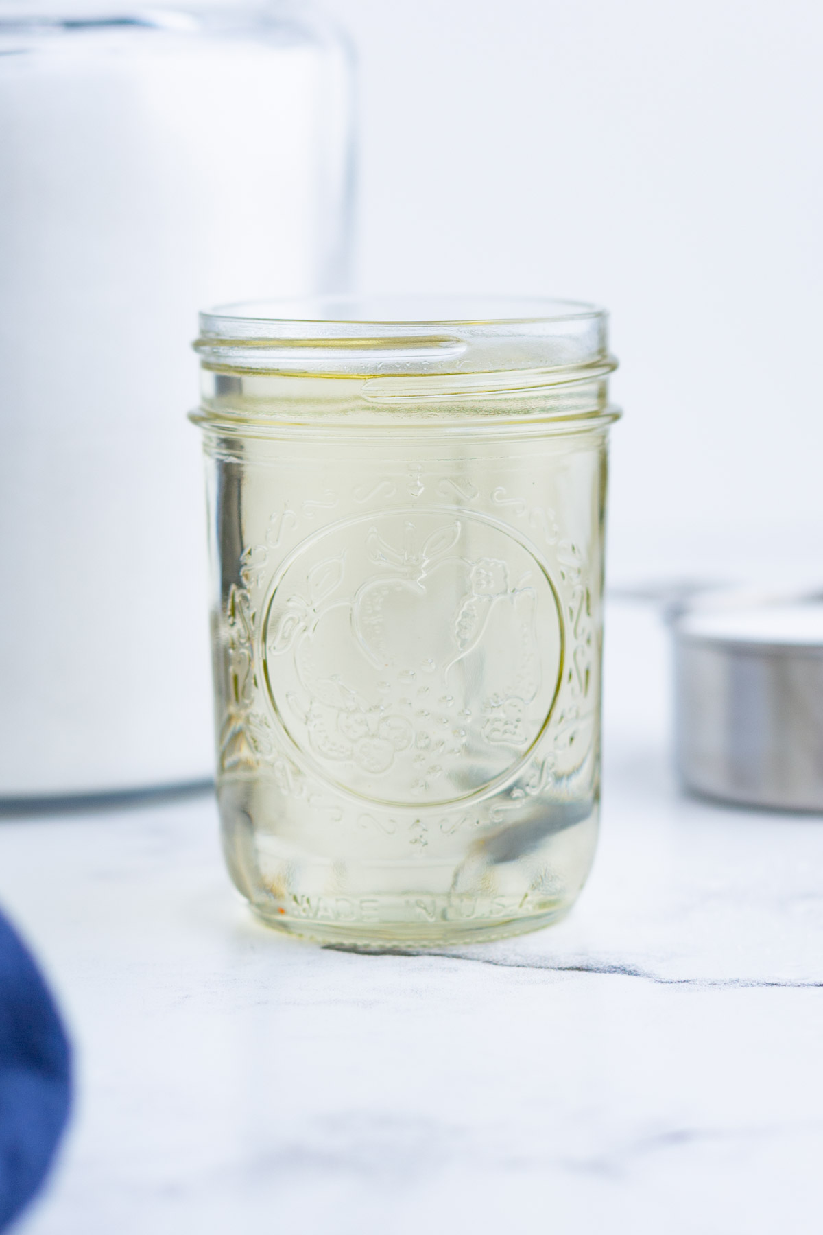 A glass jar is the perfect way to store simple syrup.