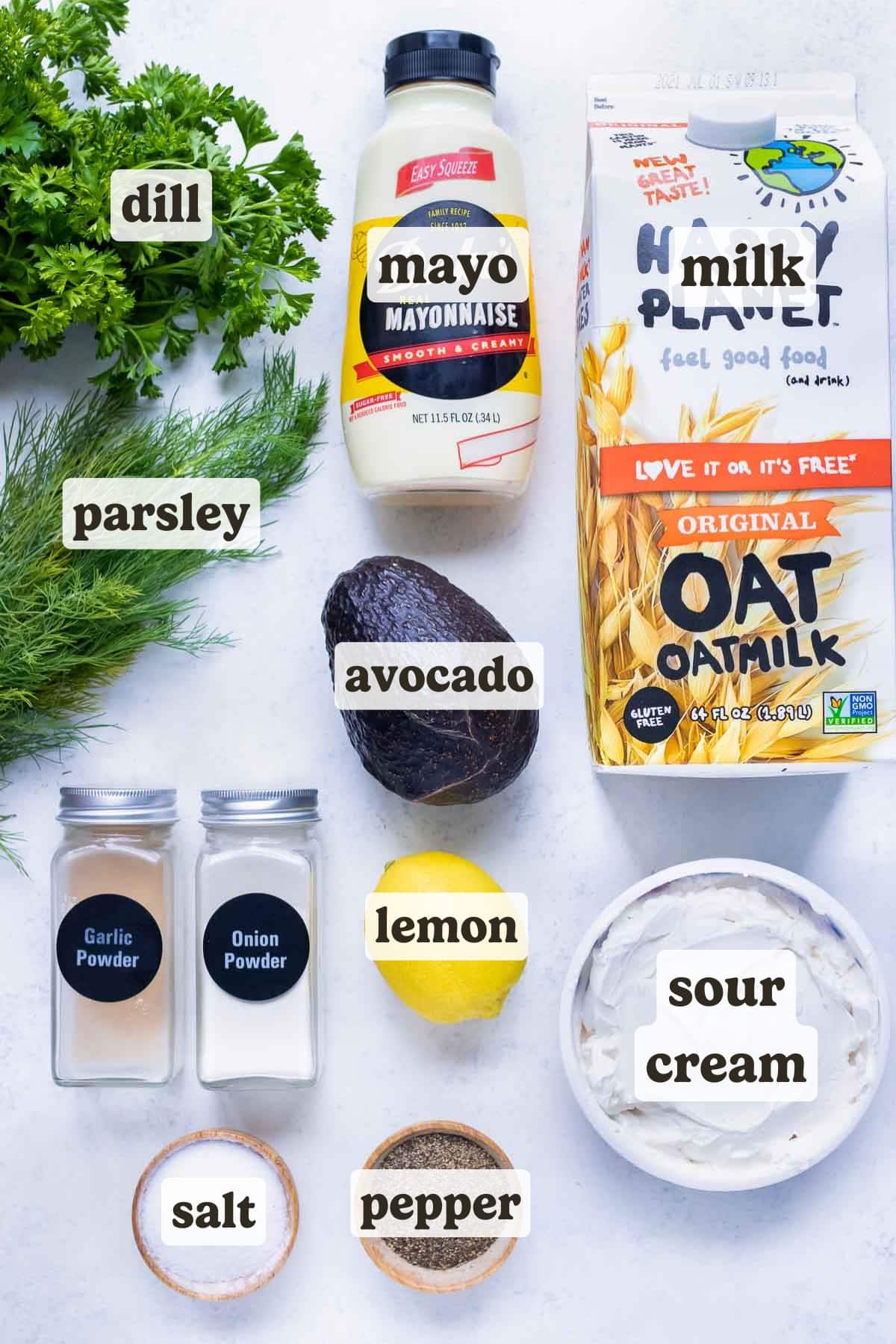 Milk, avocado, parlsey, dill, lemon juice, mayonnaise, garlic powder, onion powder, and sour cream are the ingredients in this avocado ranch dressing recipe.