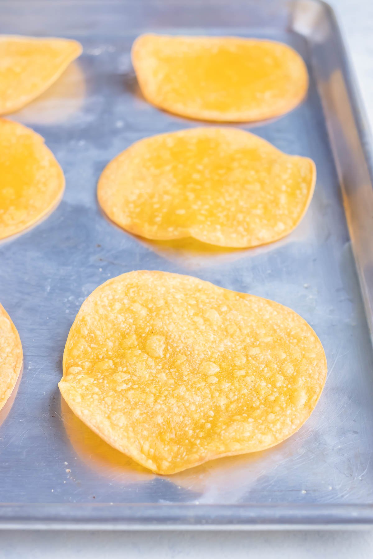 Corn tortillas are baked in the oven.