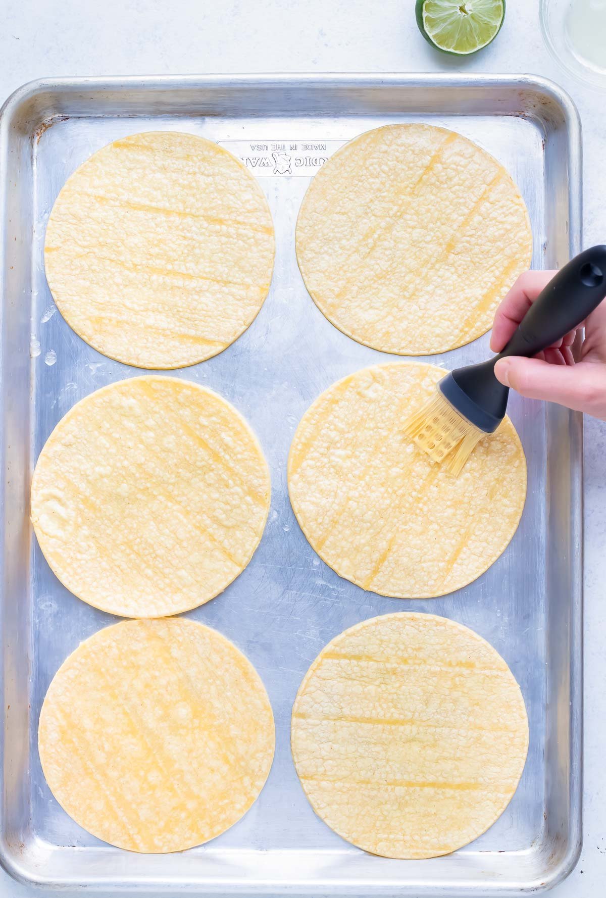 Corn tortillas are baked until crispy.