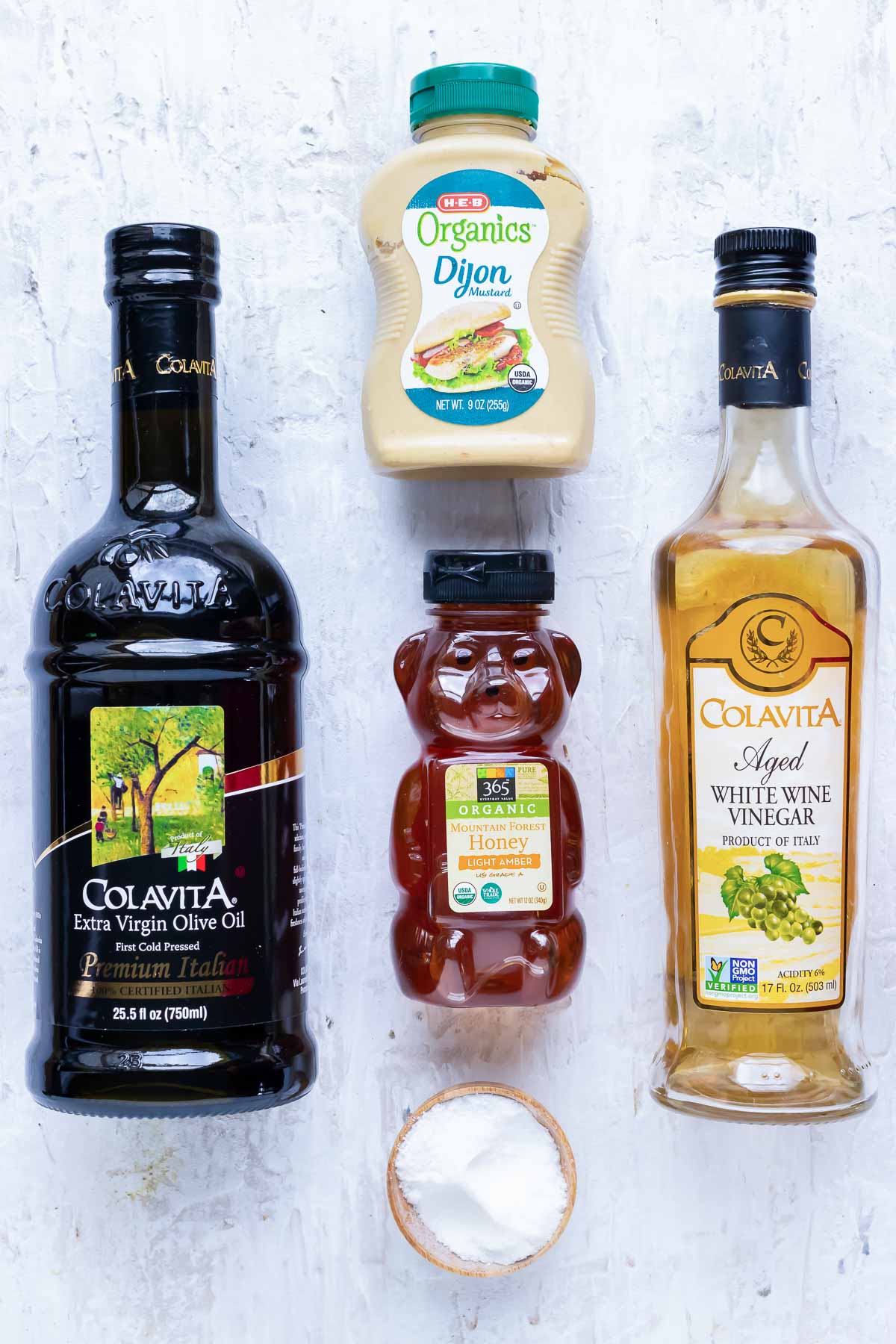 Honey, Dijon mustard, olive oil, vinegar, and salt as the ingredients for honey mustard.