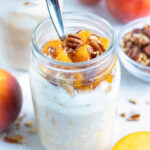 Peach cobbler overnight oats are made in a mason jar for an easy, on-the-go breakfast or snack.