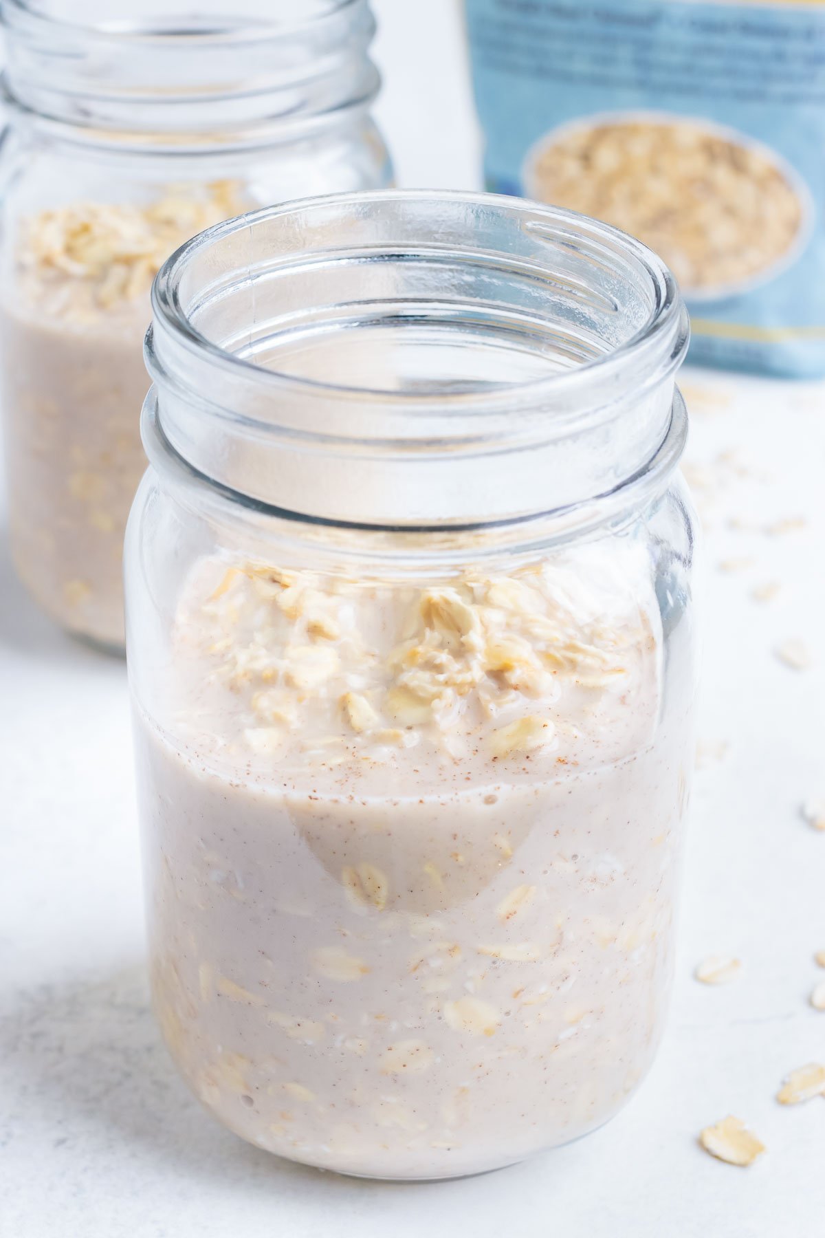 The oatmeal base is added to a mason jar.