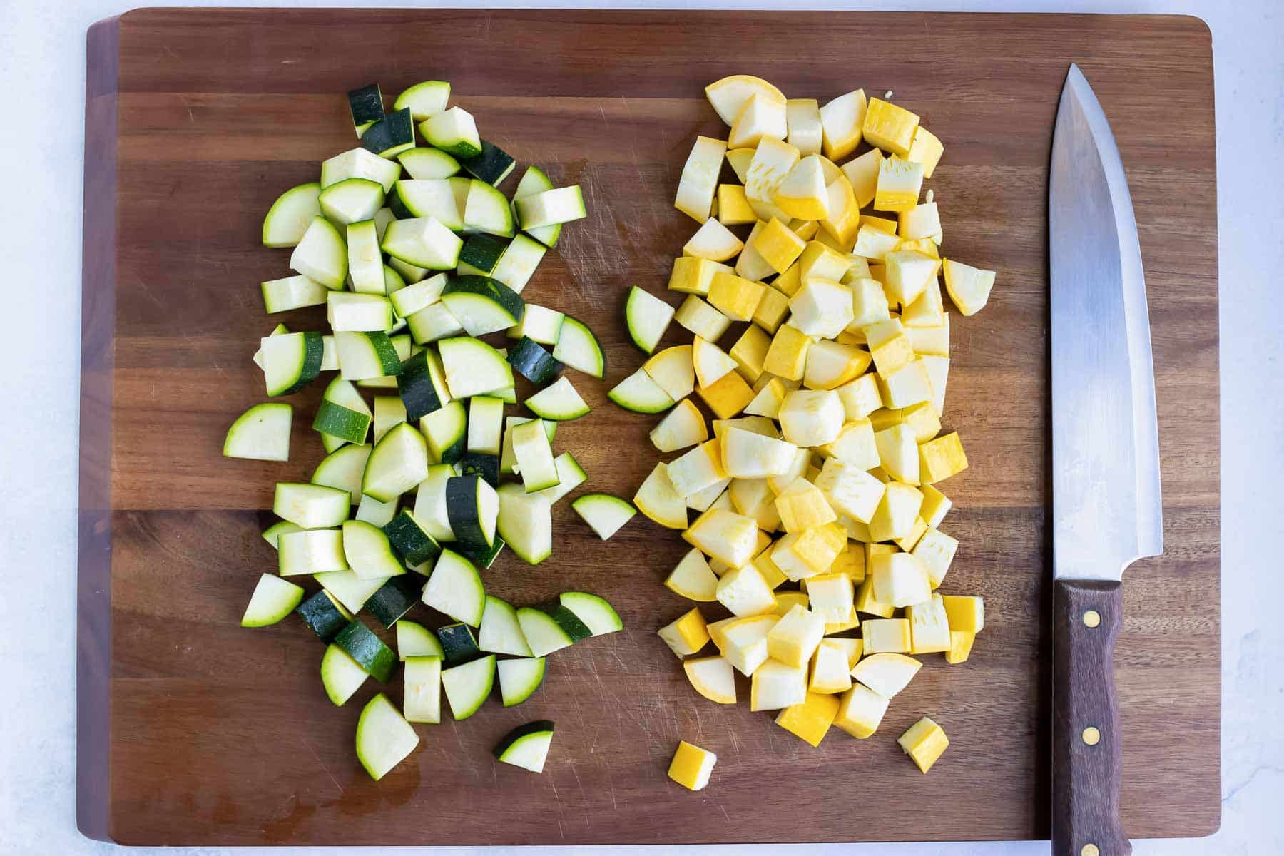 Diced zucchini and yellow squash are ready for this recipe.