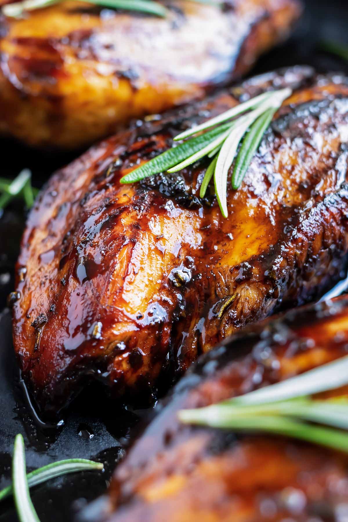 Juicy chicken breast recipe that is covered in a honey balsamic glaze.