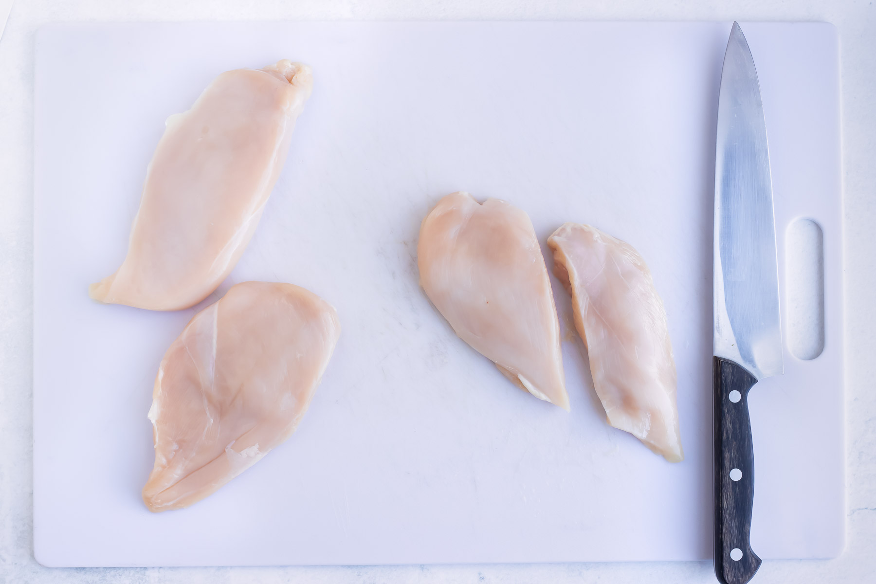 Equal sized chicken breast portions for juicy, tender, meat.