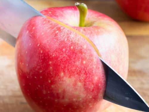 Using a large knife, cut the apple on all sides of the core.