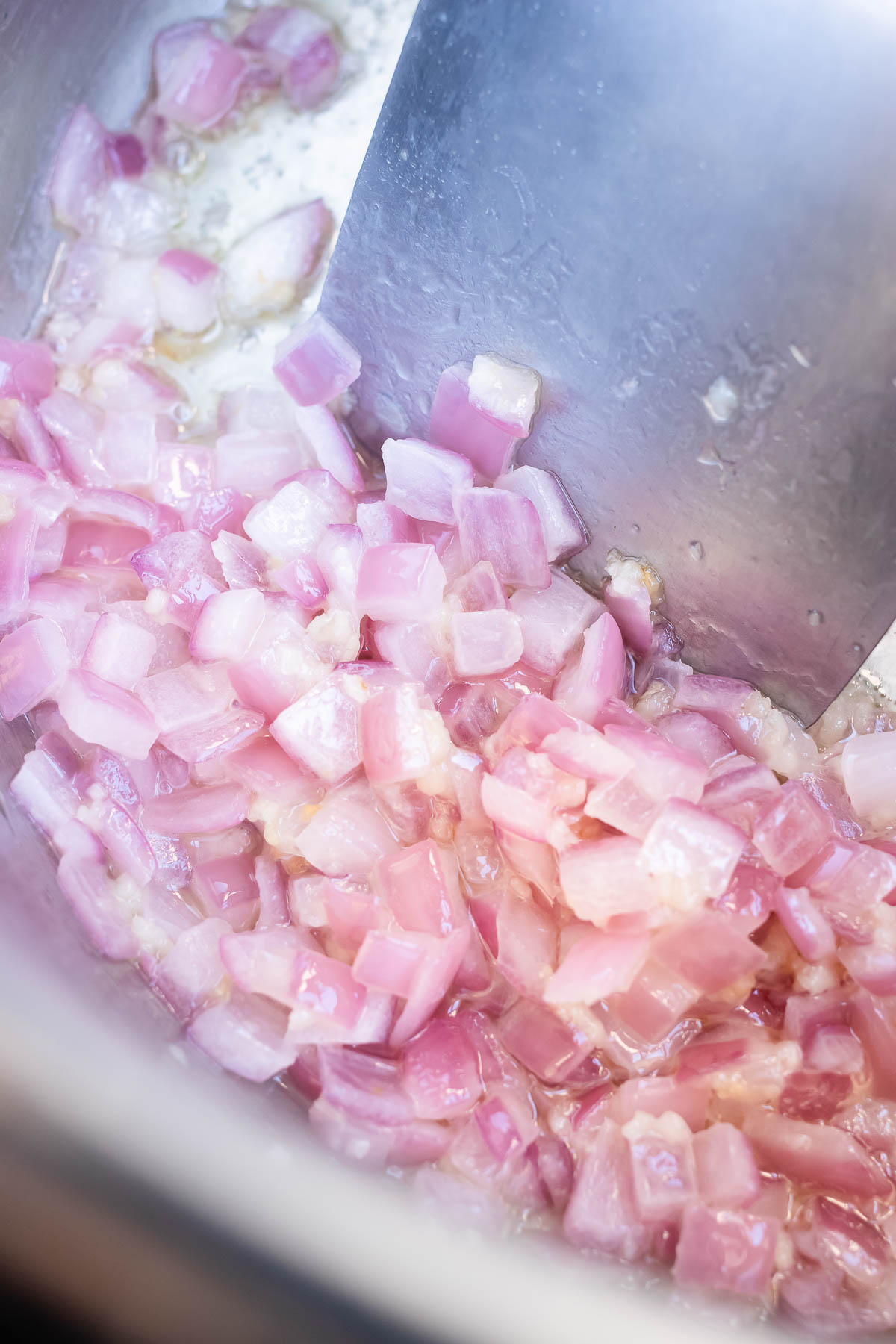 Onion is added to the Instant Pot.