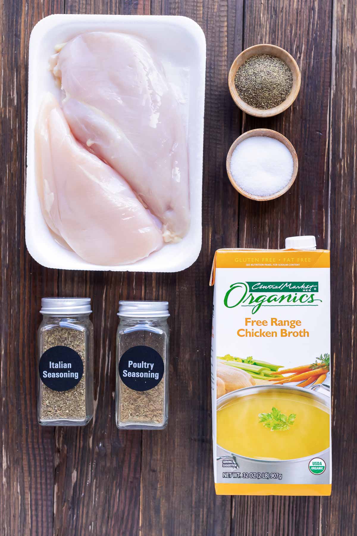Chicken, salt, pepper, broth, and seasoning mixes as the ingredients for an easy shredded chicken recipe.