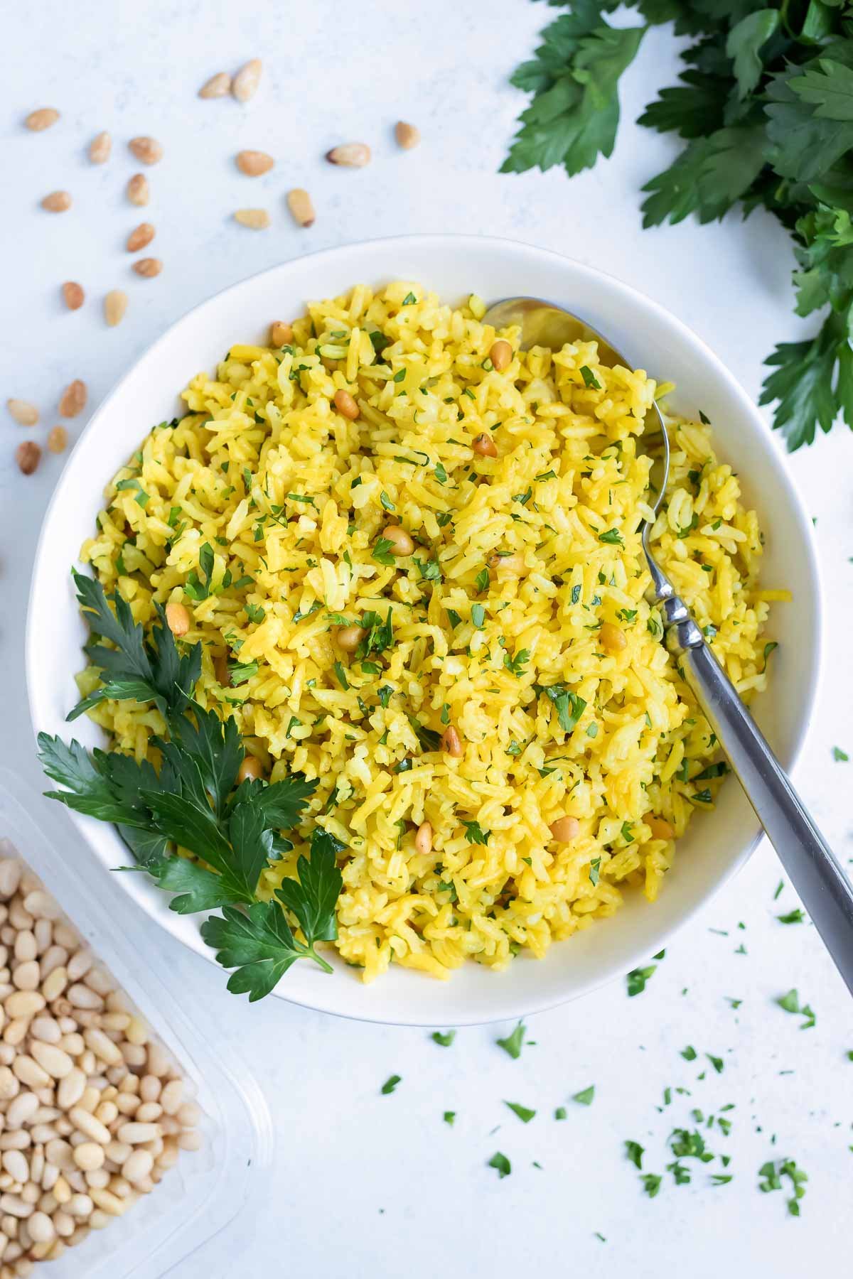 An overhead picture shows the yellow rice in a bowl.