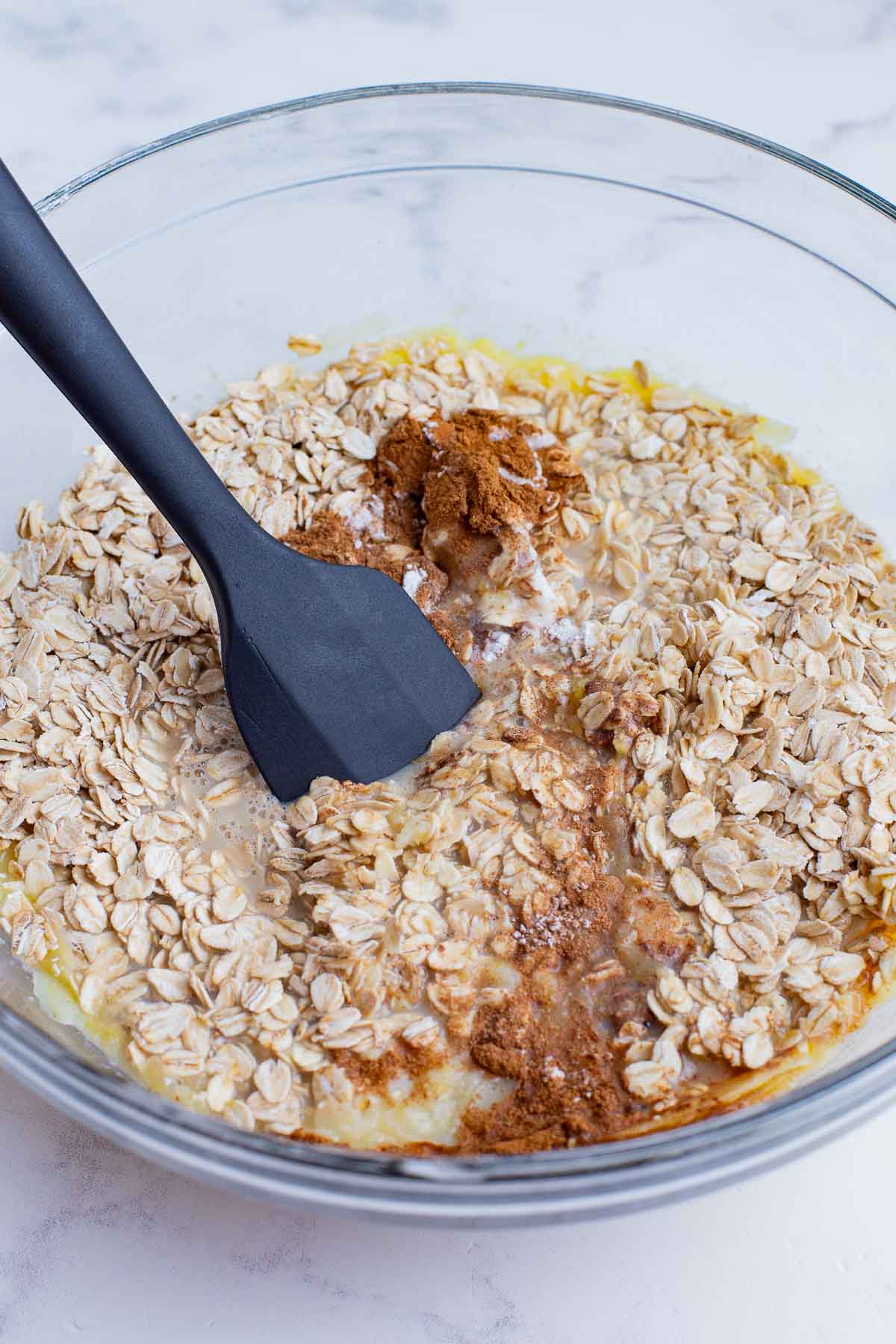 Oats and spices are added to the mix.