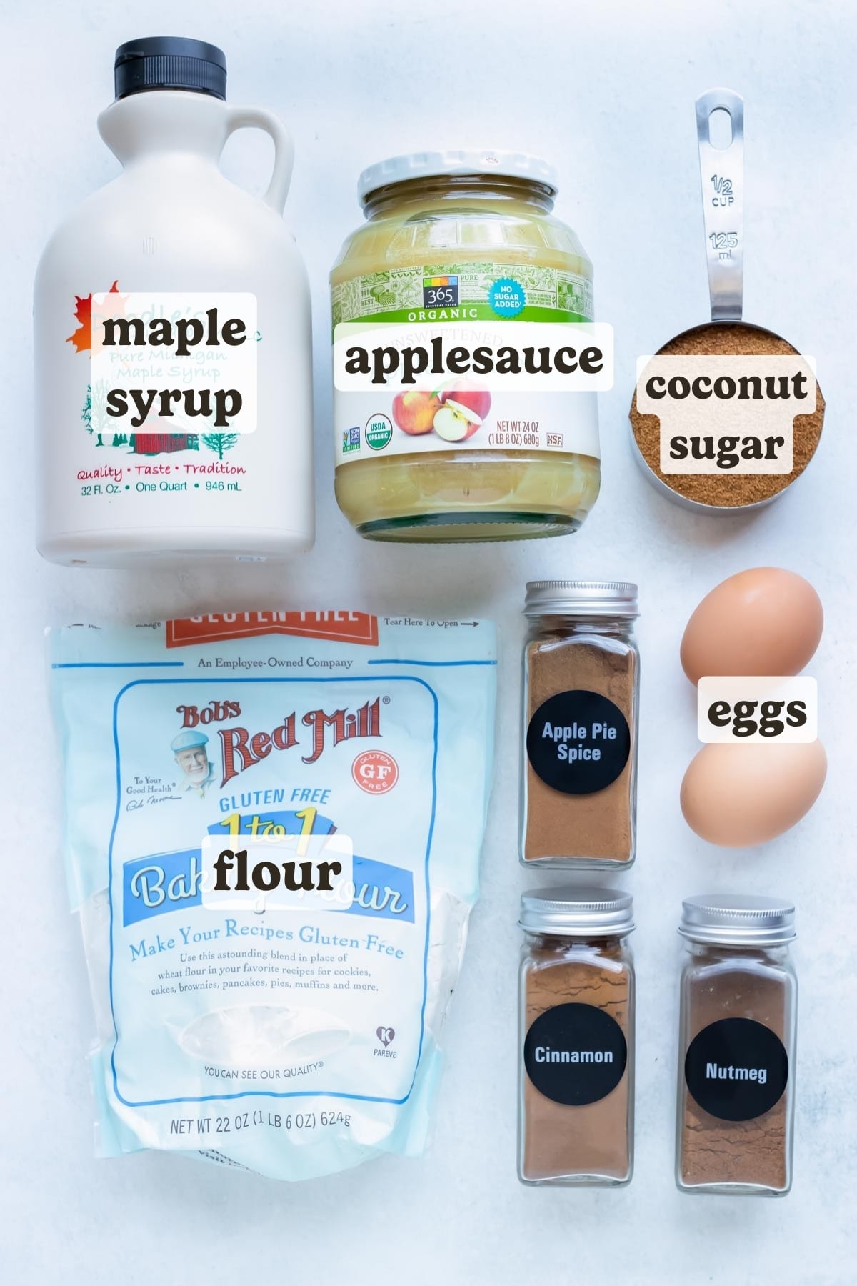 Applesauce, maple syrup, gluten-free flour, eggs, and spices come together in this applesauce muffin recipe.