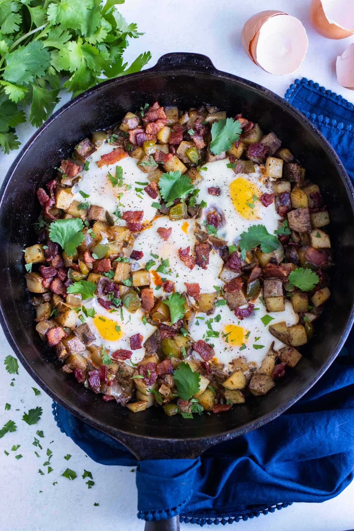 Gluten-free and dairy-free breakfast hash is served from a skillet.